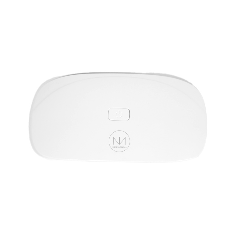 Компактна лампа для сушіння гелевих нігтів